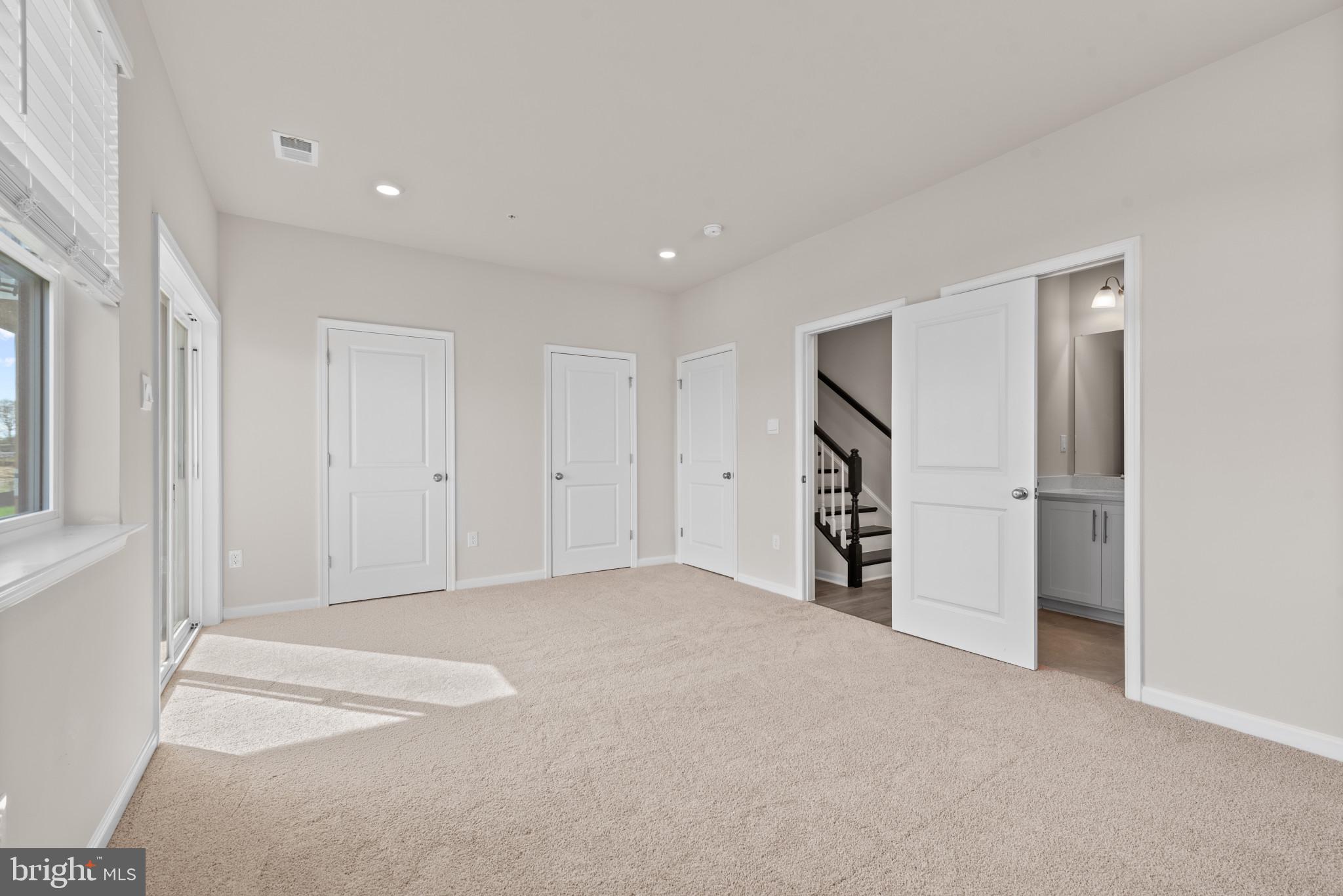 425 Ensemble Way Frederick, MD 21701 - Photo 6 of 37 a view of a big room with closet and windows