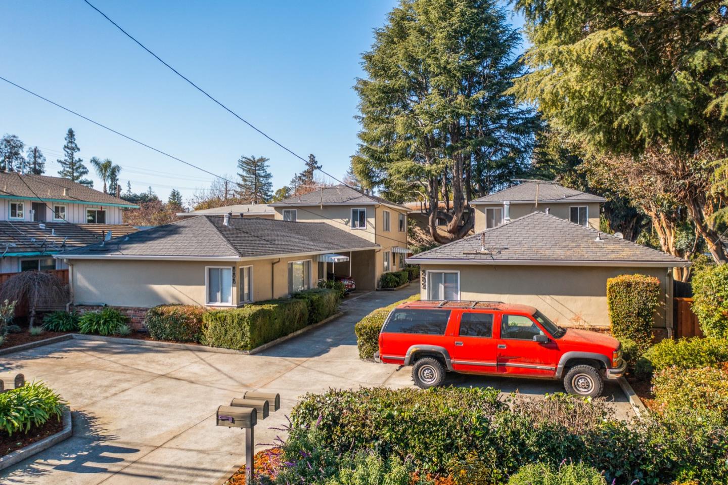 882 Middle Avenue Menlo Park, CA 94025 - Photo 4 of 22 a front view of house with yard and outdoor seating