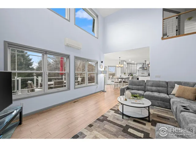 a bathroom with a sink mirror and a shower