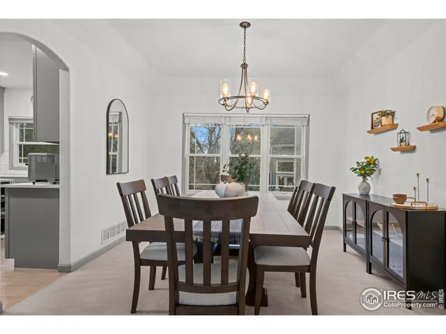 a bathroom with a sink a mirror and a toilet