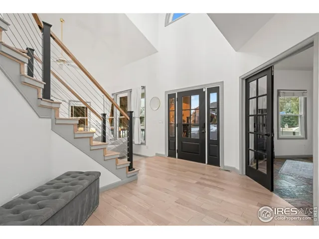 a kitchen with a sink a stove and cabinets