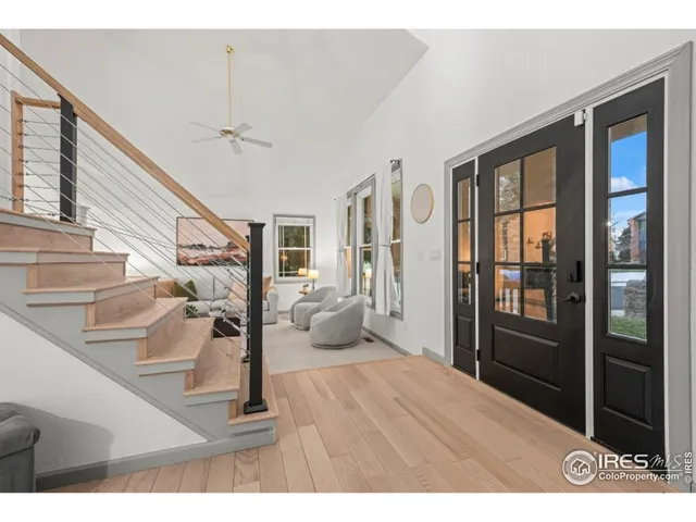a kitchen with stainless steel appliances kitchen island granite countertop a sink stove and refrigerator