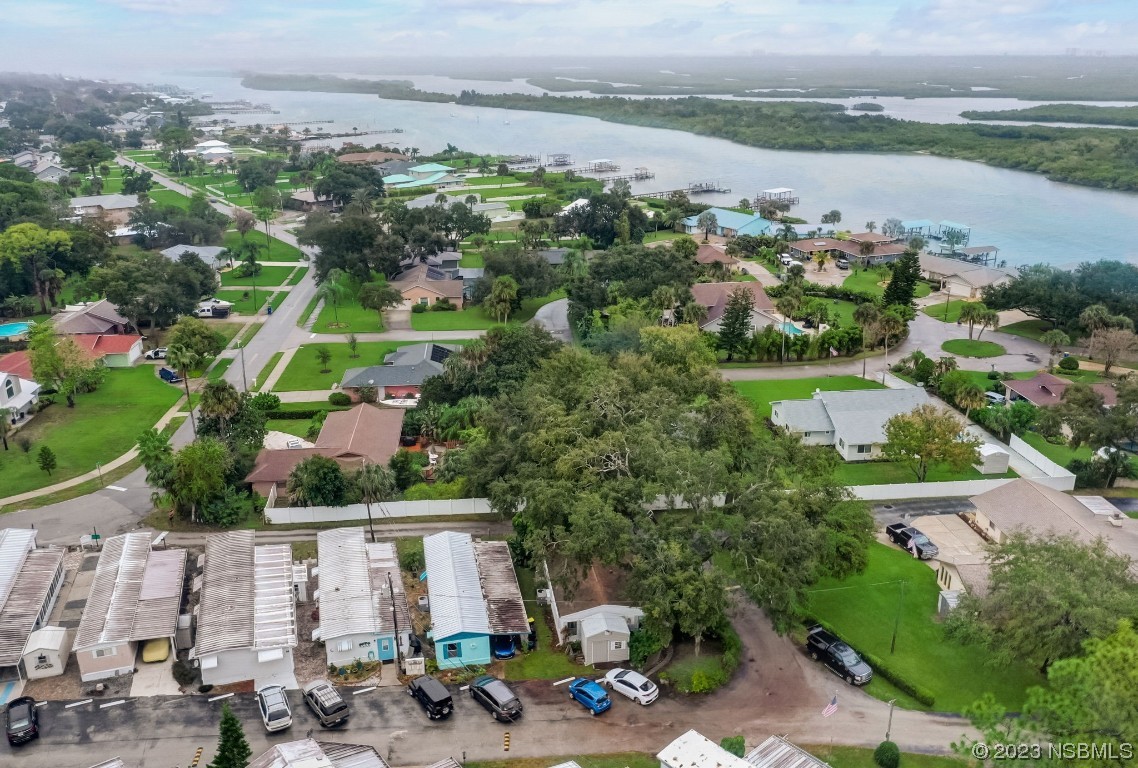 2201 South Ridgewood Avenue, Unit 21 Edgewater, FL 32141 - Photo 33 of 38 an aerial view of multiple house