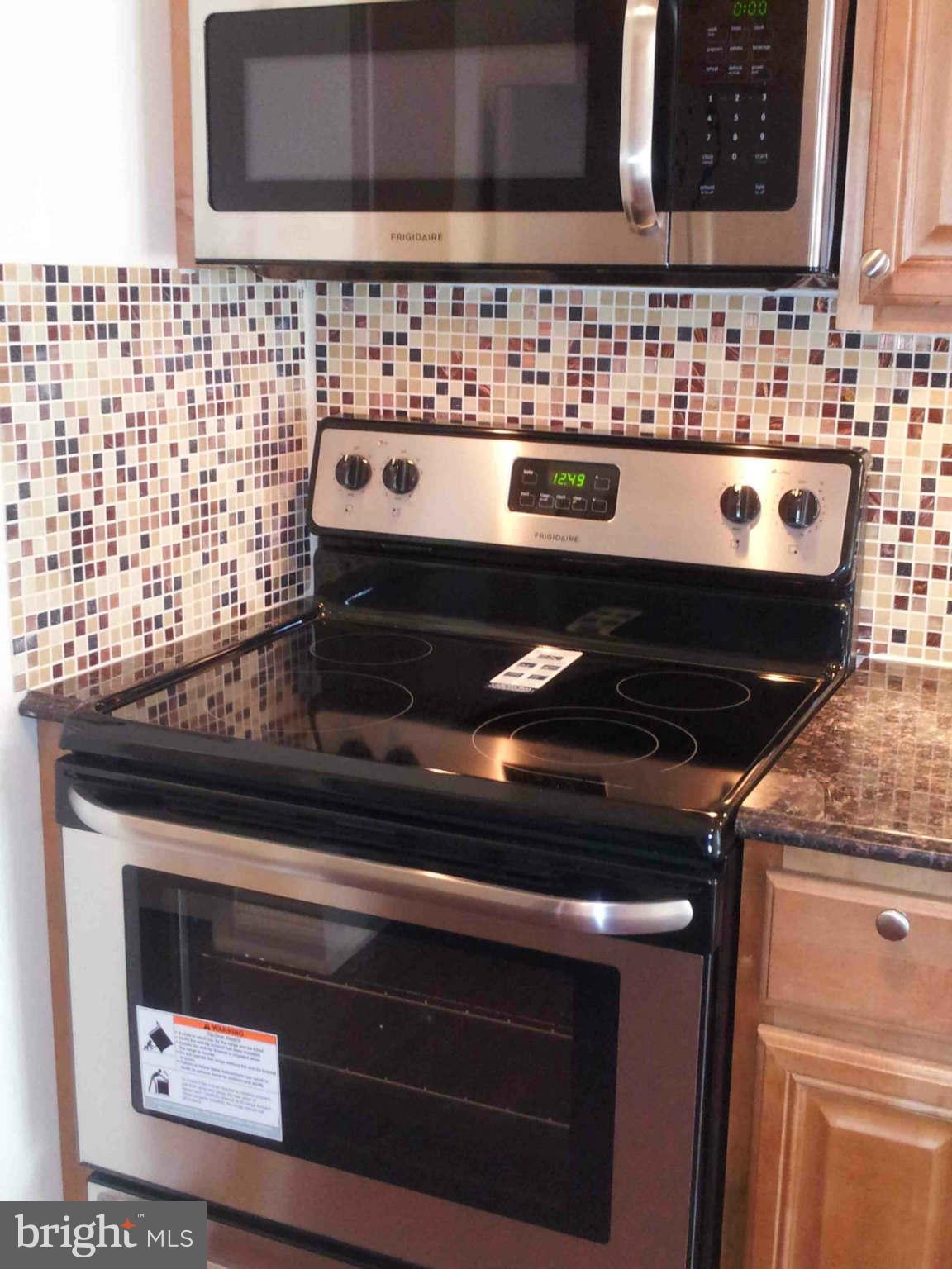 4731 Sheriff Road Northeast Washington, DC 20019 - Photo 22 of 30 Kitchen Detail - Range & Microwave