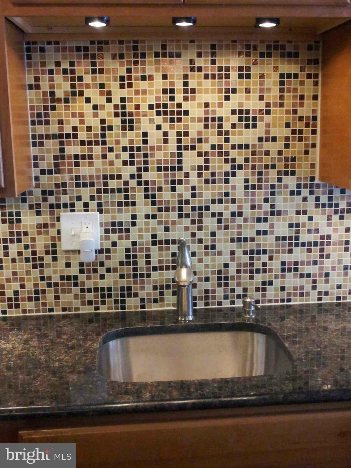 4731 Sheriff Road Northeast Washington, DC 20019 - Photo 23 of 30 Kitchen Detail - Mosaic Tile Backsplash
