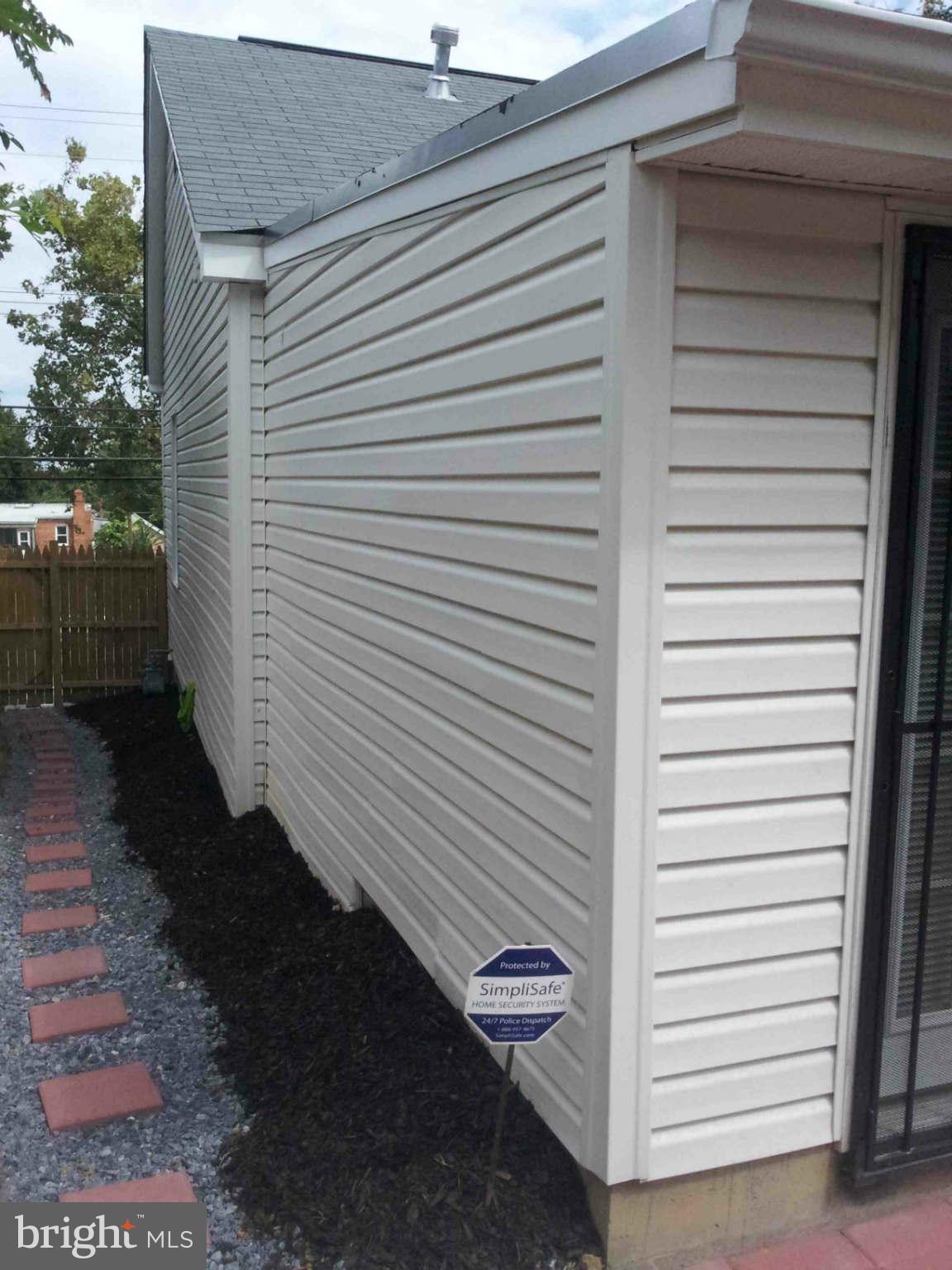 4731 Sheriff Road Northeast Washington, DC 20019 - Photo 28 of 30 Exterior Side Paver Walk