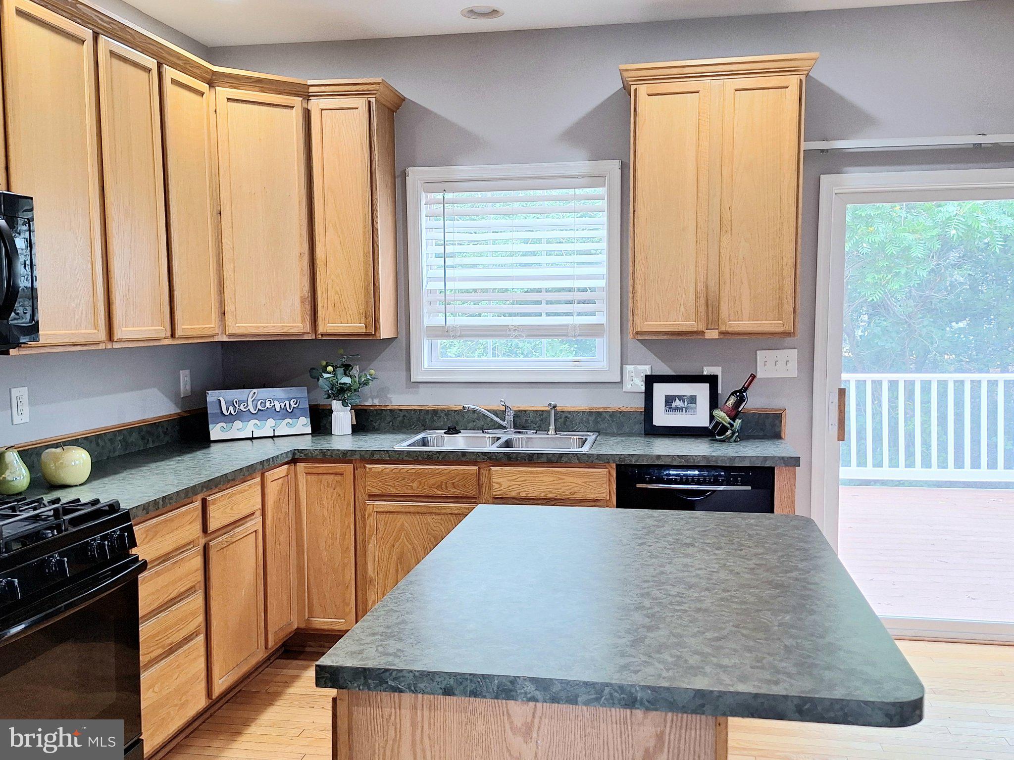 7906 Springridge Road Glen Burnie, MD 21060 - Photo 6 of 28 Bright and inviting kitchen space.