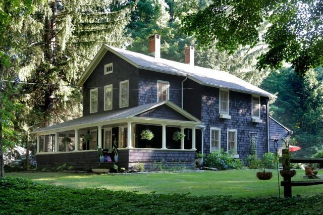 33 Station Road Redding, CT 06896 - Photo 1 of 1 a front view of a house with a yard