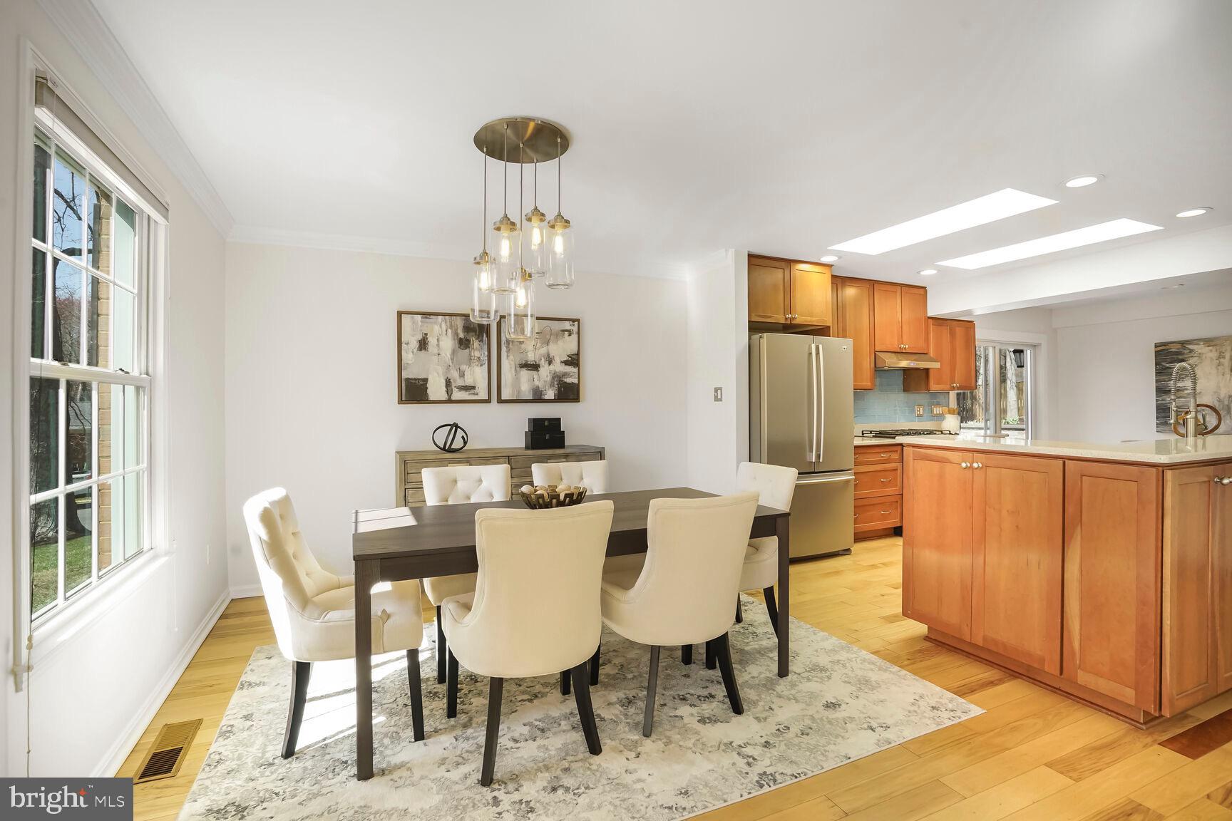 8618 Crestview Drive Fairfax, VA 22031 - Photo 11 of 33 a view of a dining room with furniture window and wooden floor