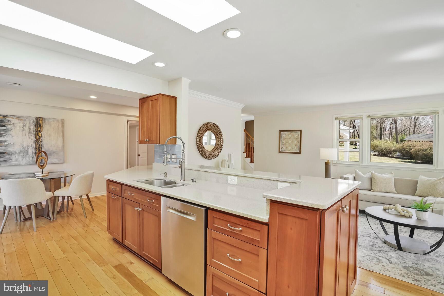 8618 Crestview Drive Fairfax, VA 22031 - Photo 13 of 33 a dining hall with stainless steel appliances granite countertop a stove and a wooden floors