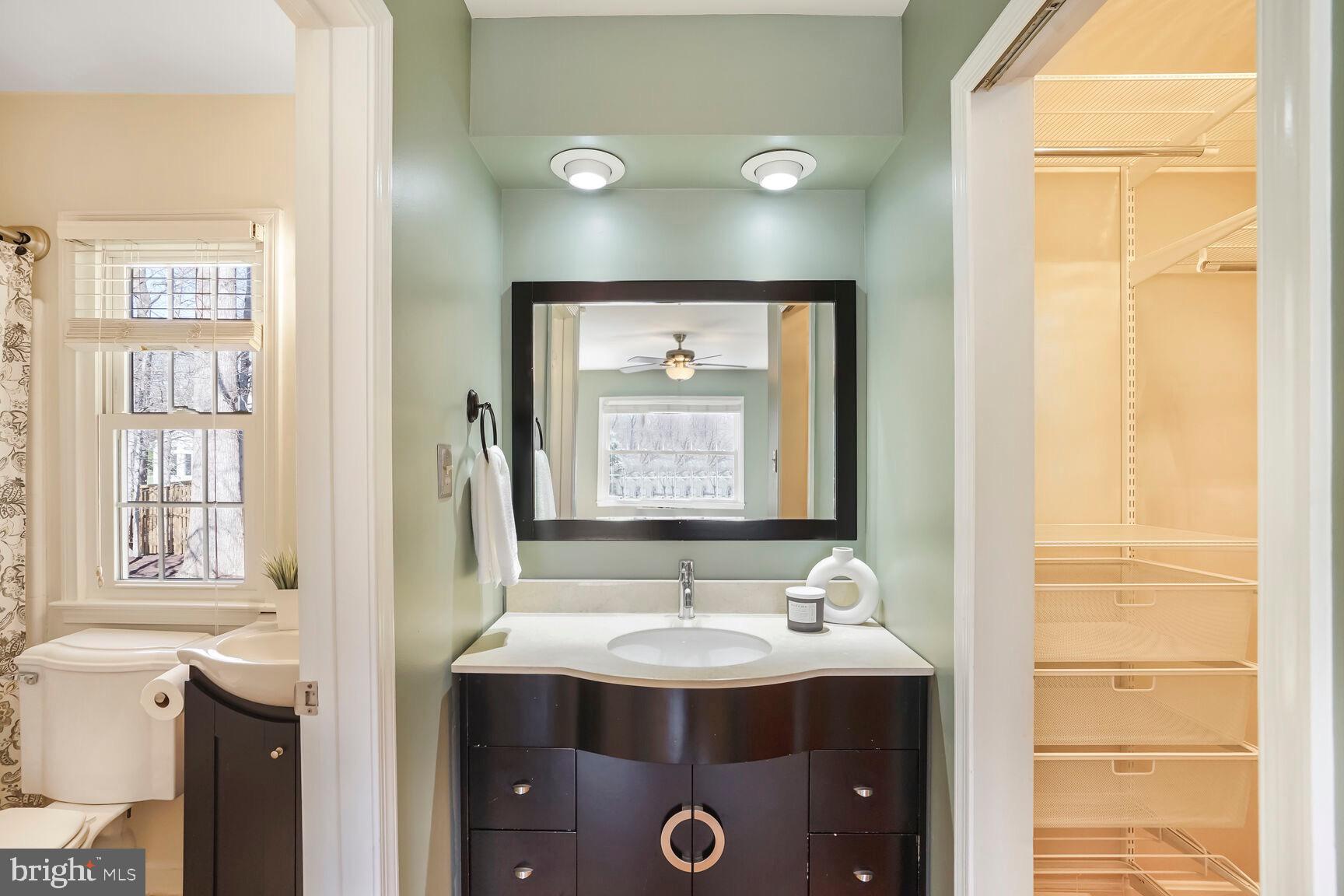 8618 Crestview Drive Fairfax, VA 22031 - Photo 24 of 33 a bathroom with a sink and a mirror