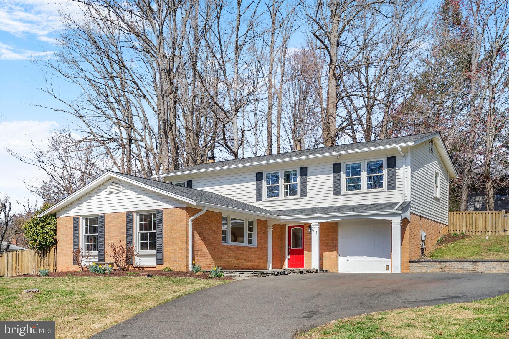 8618 Crestview Drive Fairfax, VA 22031 - Photo 3 of 33 a front view of a house with garden