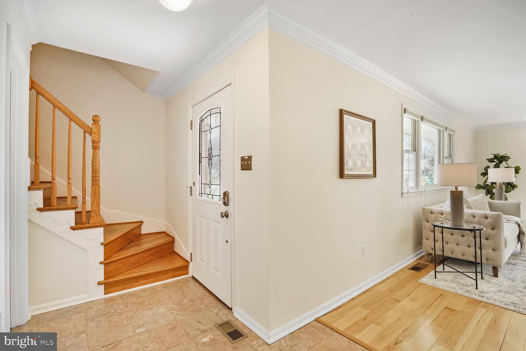 8618 Crestview Drive Fairfax, VA 22031 - Photo 5 of 33 a living room with furniture and a table