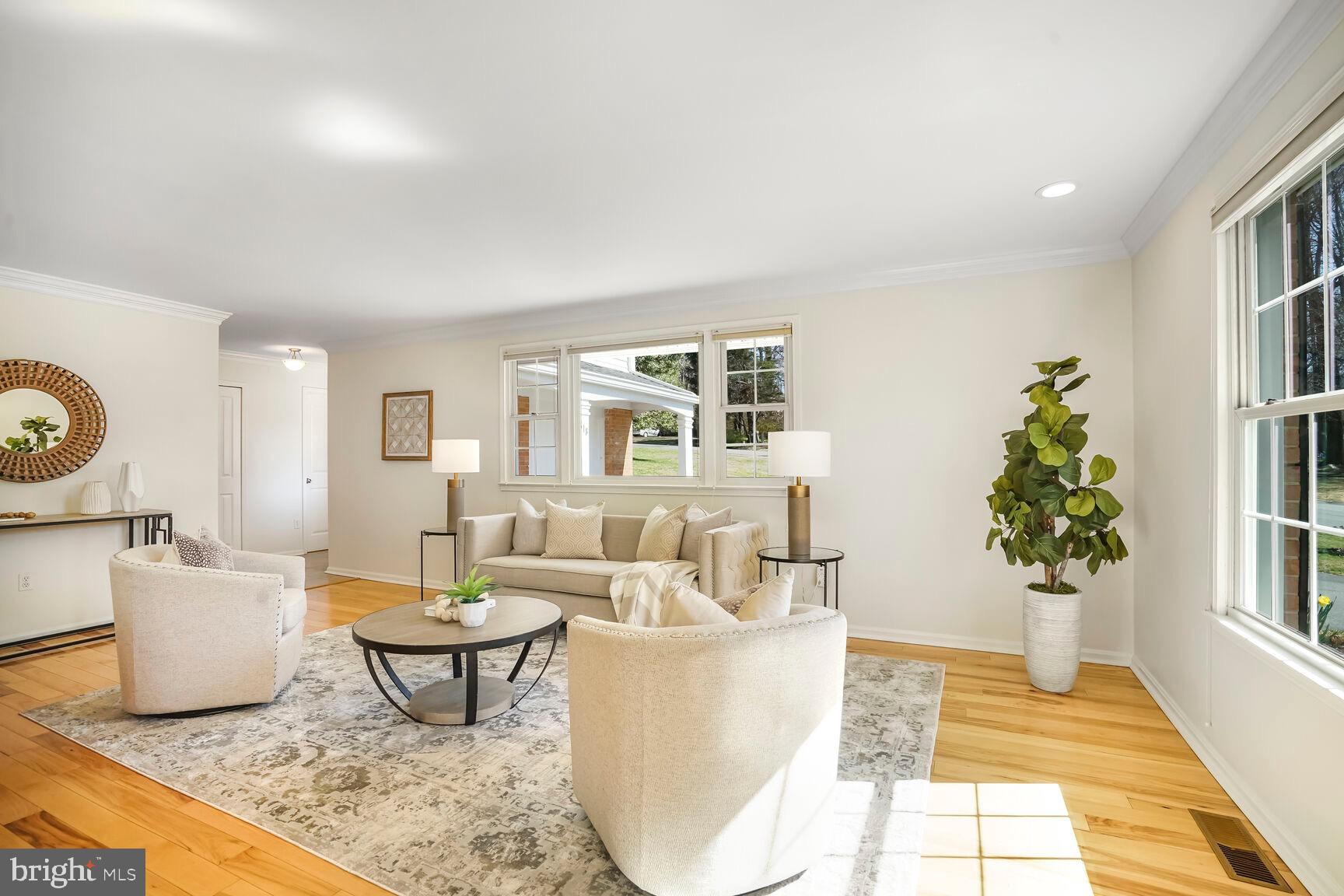 8618 Crestview Drive Fairfax, VA 22031 - Photo 6 of 33 a living room with furniture and a potted plant