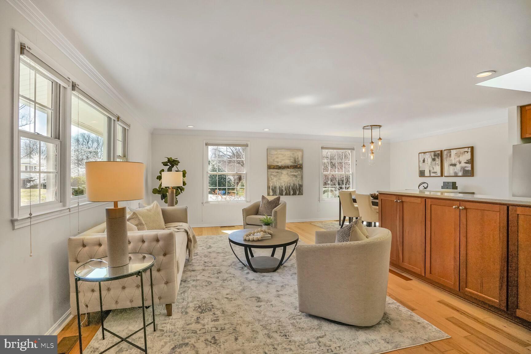 8618 Crestview Drive Fairfax, VA 22031 - Photo 7 of 33 a living room with furniture a window and a table