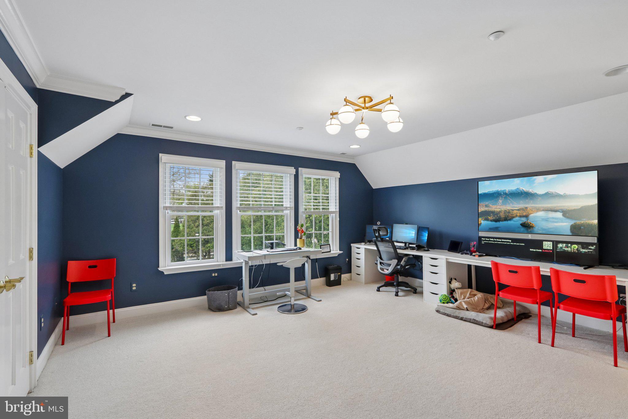 209 Welsh Road Ambler, PA 19002 - Photo 59 of 80 a living room with furniture gym equipment and a large window