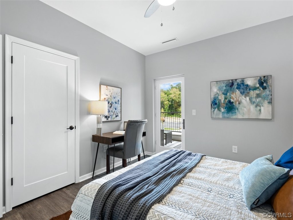 1504 Ewing Park Loop, Unit 201 Midlothian, VA 23113 - Photo 16 of 20 a bedroom with a bed and a table in it