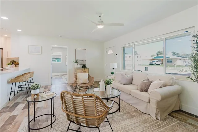 a living room with furniture and a table