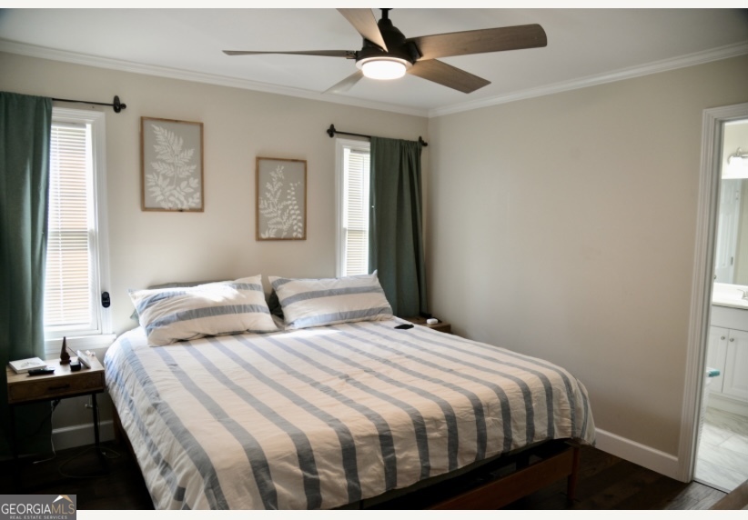 505 Ridgeland Drive Sandersville, GA 31082 - Photo 8 of 8 a bedroom with bed and a window