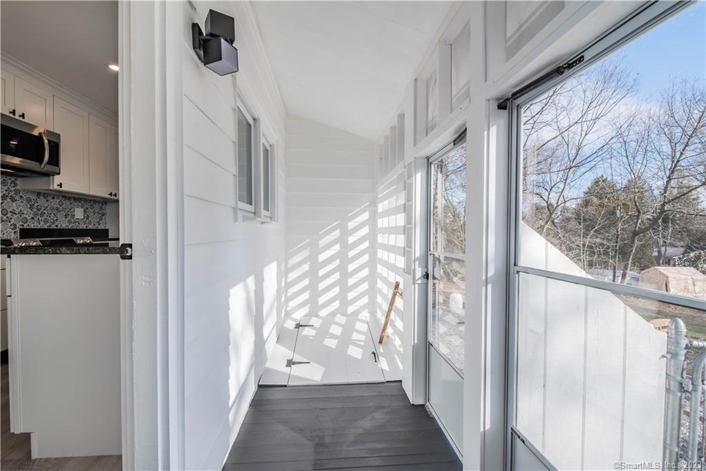 365 Woodbury Road Watertown, CT 06795 - Photo 19 of 29 Back porch off kitchen to basement and yard.