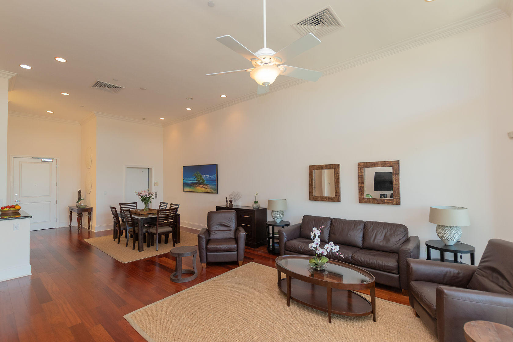 281 Trumbo Road, Unit 205 Key West, FL 33040 - Photo 12 of 35 a living room with furniture and wooden floor