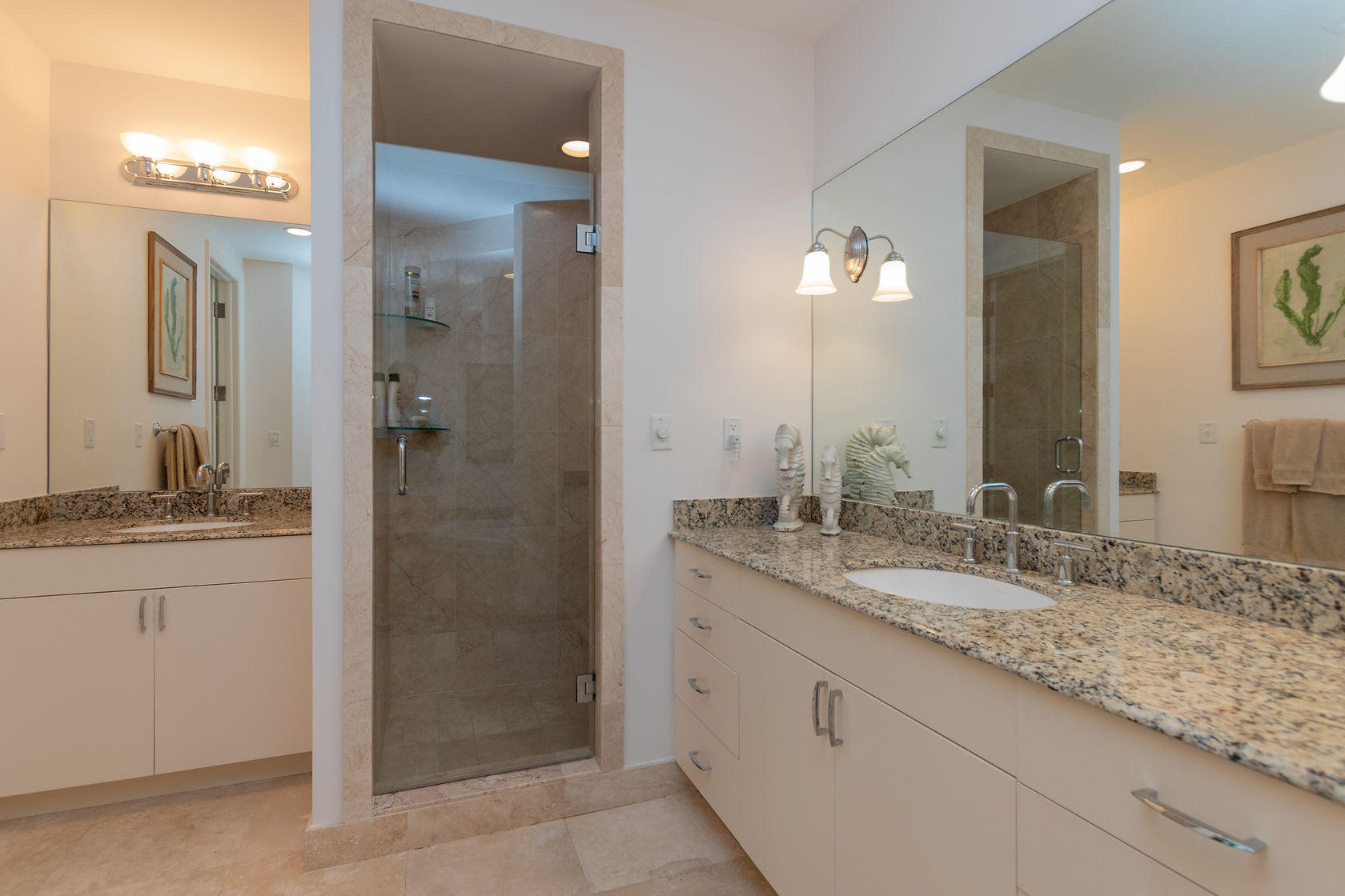 281 Trumbo Road, Unit 205 Key West, FL 33040 - Photo 20 of 35 a bathroom with a granite countertop sink and a mirror