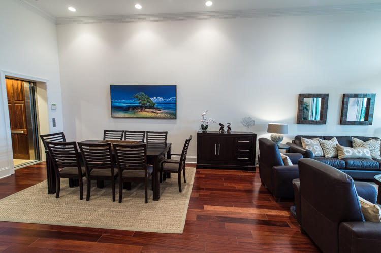 281 Trumbo Road, Unit 205 Key West, FL 33040 - Photo 2 of 35 a living room with furniture a rug and a dining table