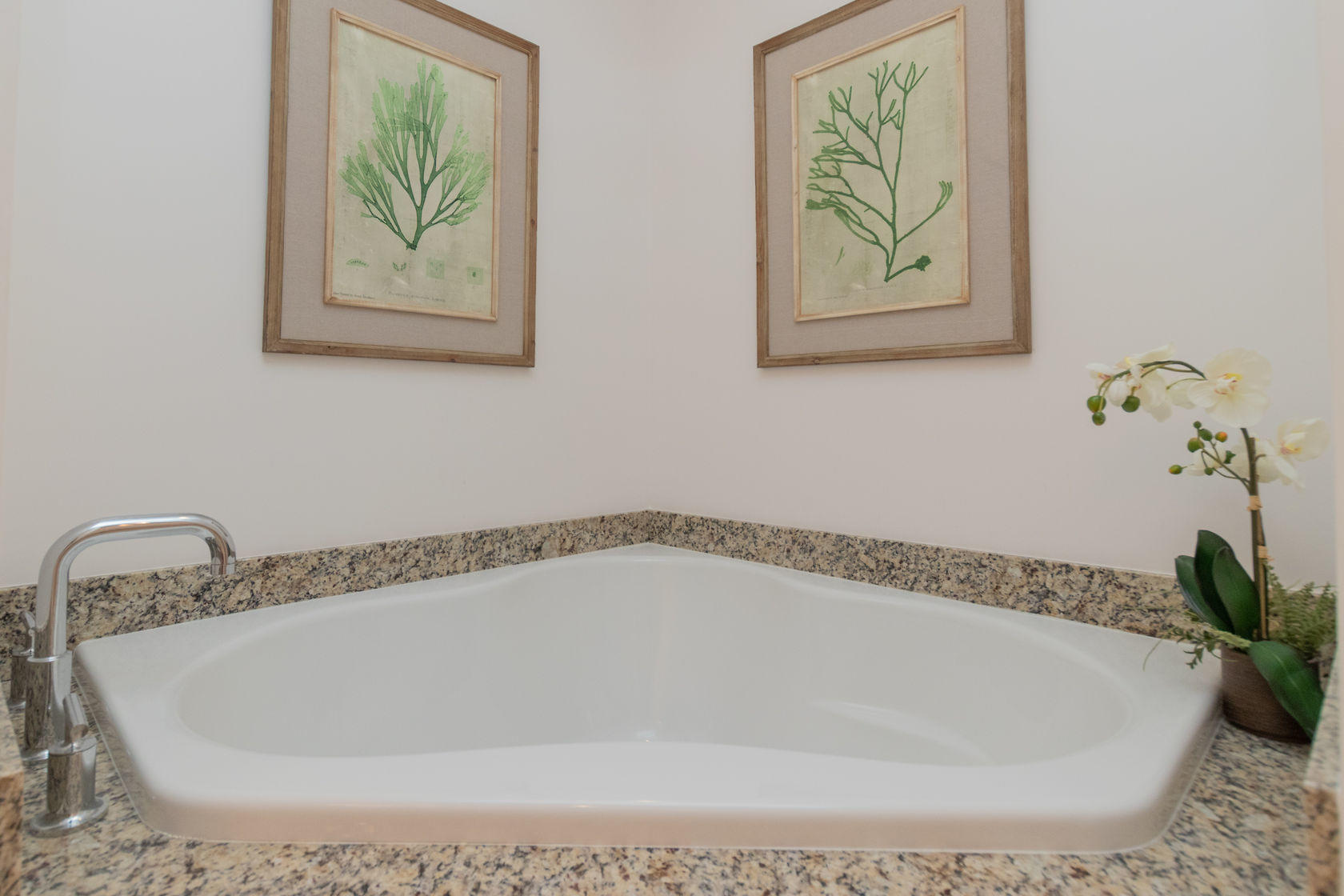 281 Trumbo Road, Unit 205 Key West, FL 33040 - Photo 21 of 35 a white bath tub sitting in a bathroom