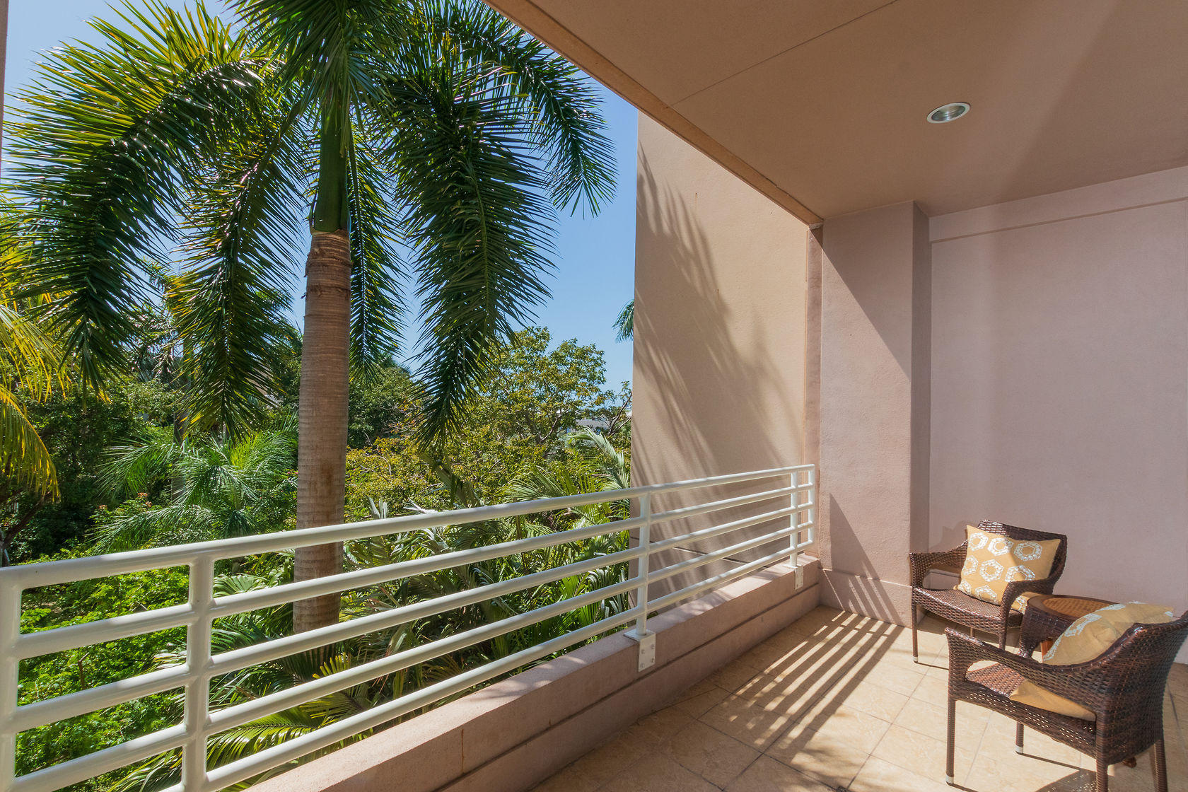281 Trumbo Road, Unit 205 Key West, FL 33040 - Photo 22 of 35 a view of a balcony with chairs