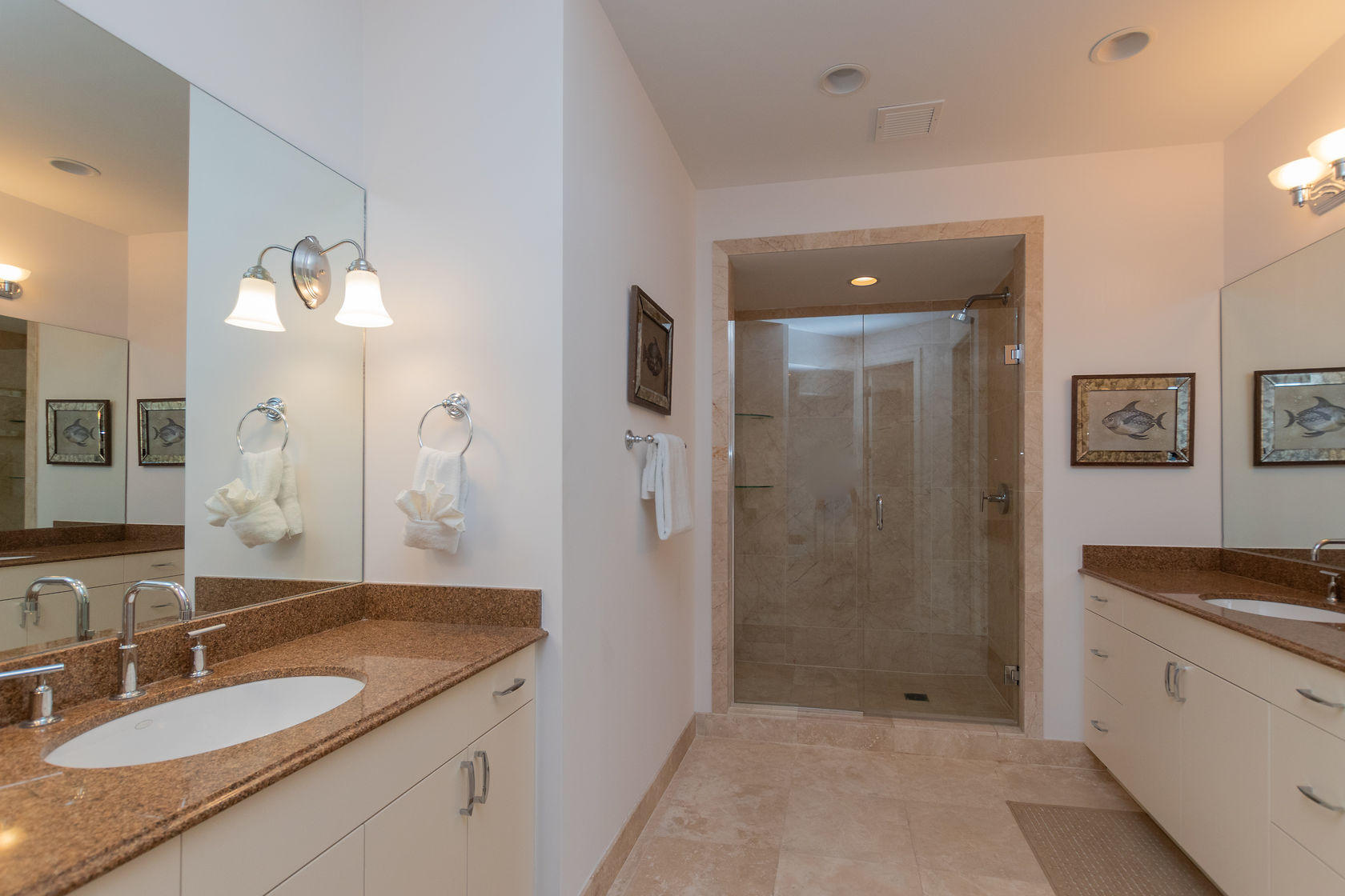 281 Trumbo Road, Unit 205 Key West, FL 33040 - Photo 24 of 35 a bathroom with a granite countertop sink mirror and shower