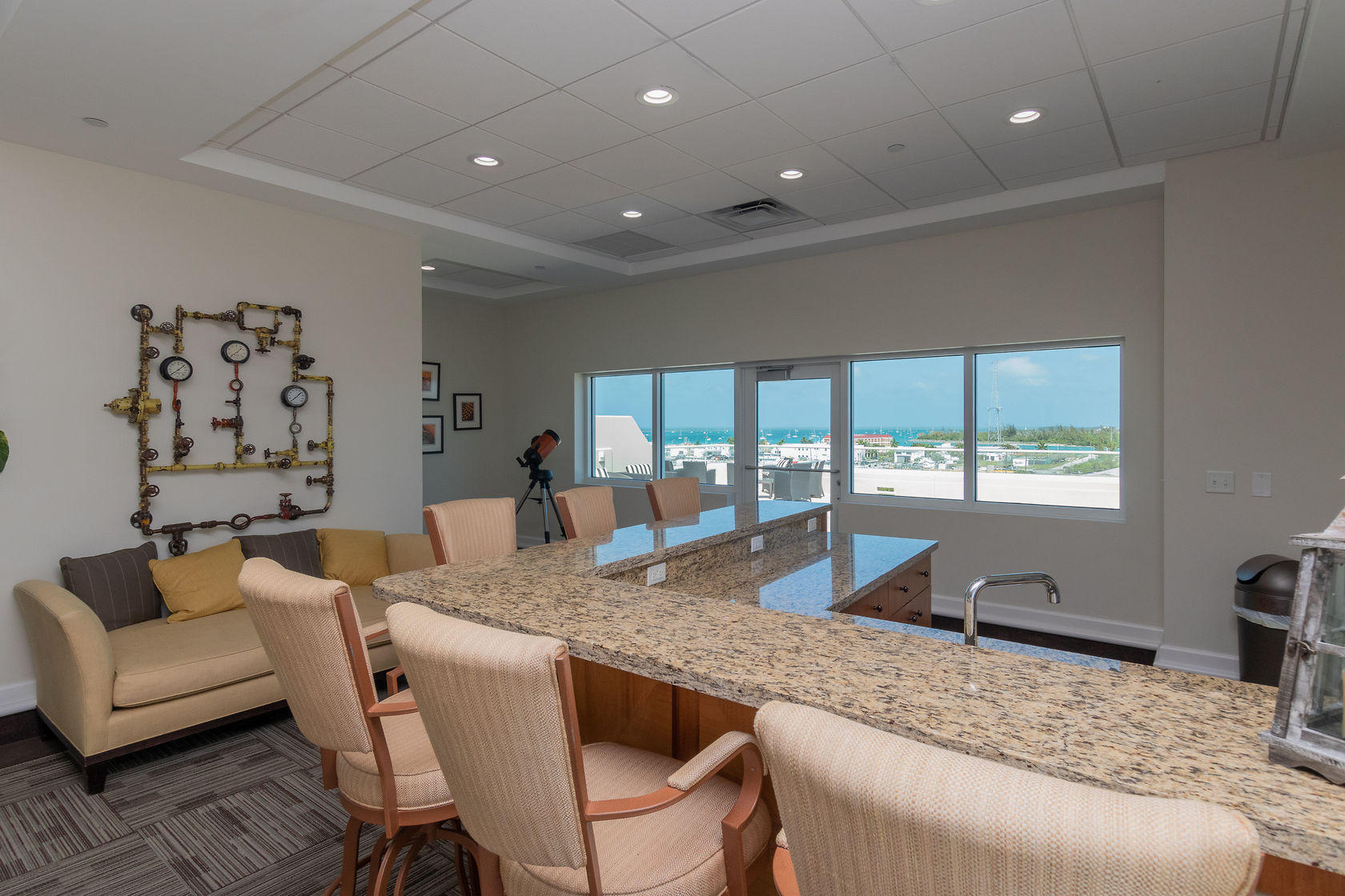 281 Trumbo Road, Unit 205 Key West, FL 33040 - Photo 31 of 35 a dining room with granite countertop kitchen island furniture and a large window