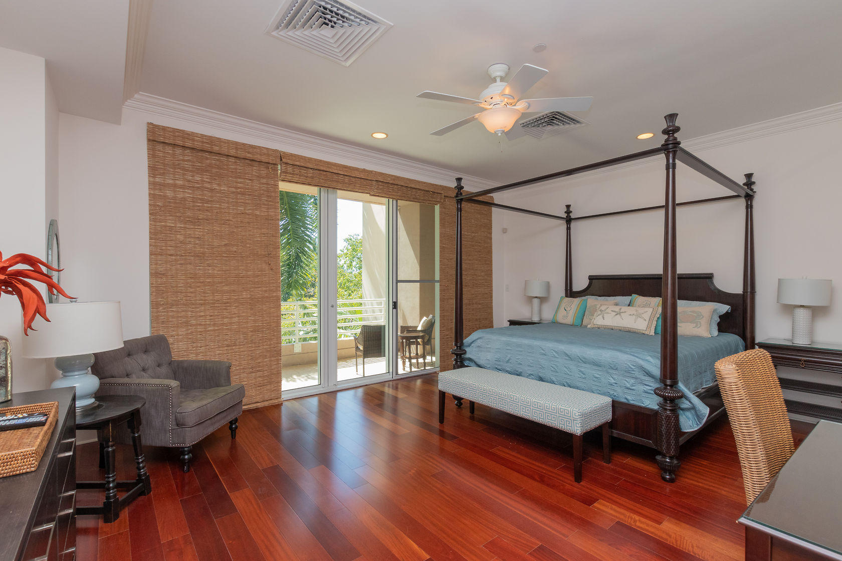 281 Trumbo Road, Unit 205 Key West, FL 33040 - Photo 6 of 35 a bedroom with a bed and wooden floor