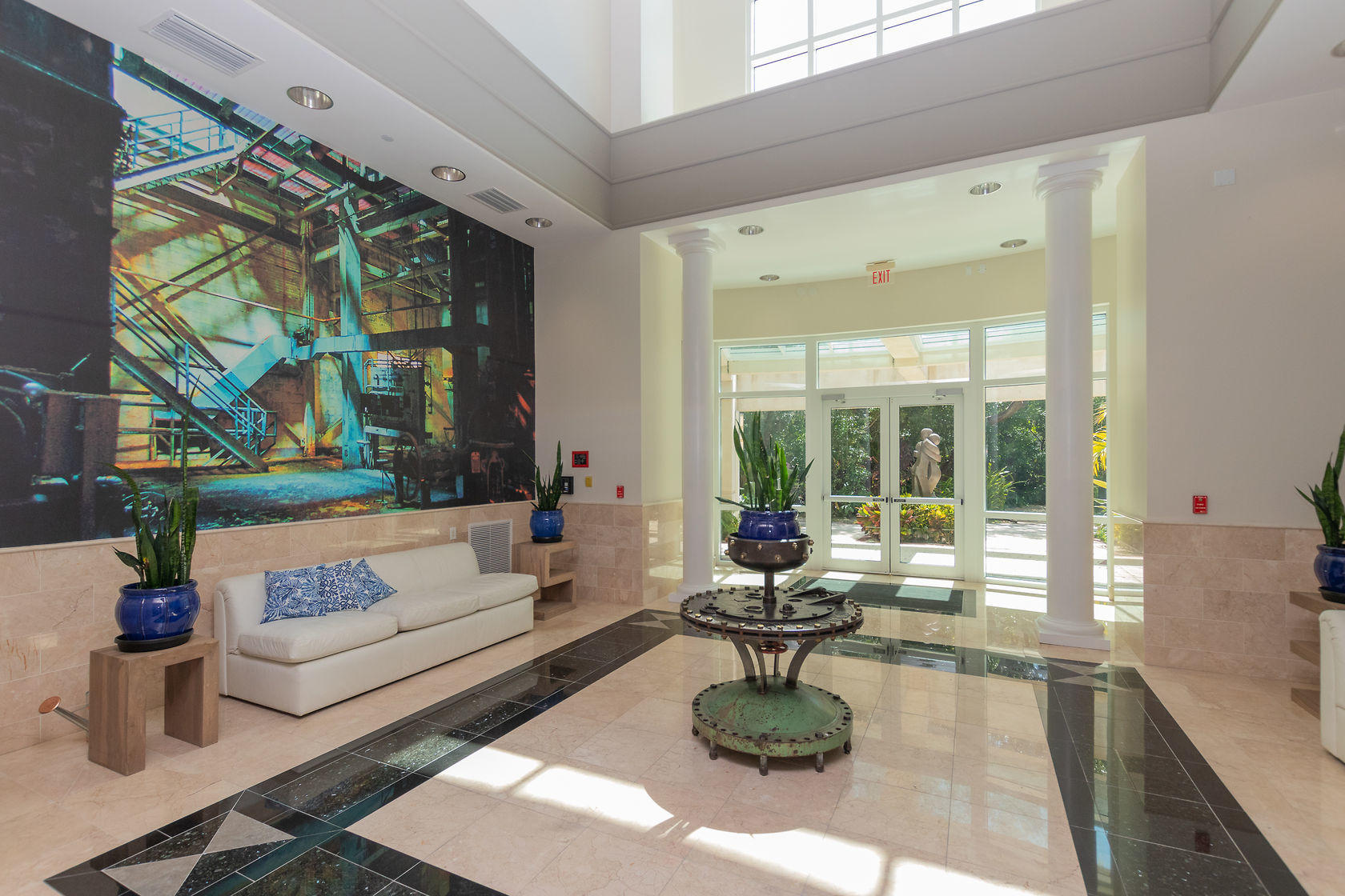 281 Trumbo Road, Unit 205 Key West, FL 33040 - Photo 9 of 35 a living room with furniture and a potted plant