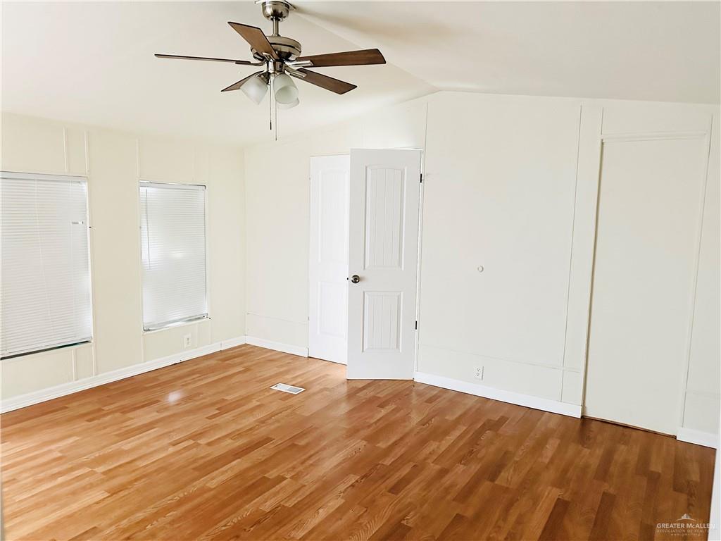 2408 Verbena Avenue Edinburg, TX 78542 - Photo 6 of 19 wooden floor in an empty room