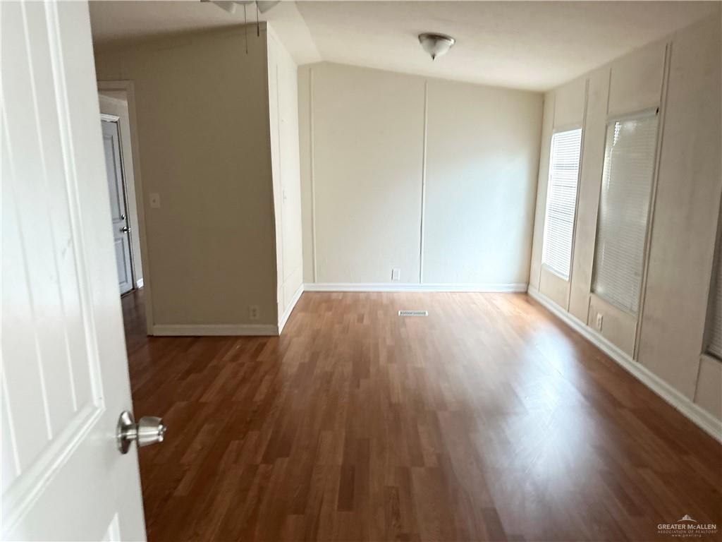 2408 Verbena Avenue Edinburg, TX 78542 - Photo 9 of 19 a view of a room with wooden floor and a window