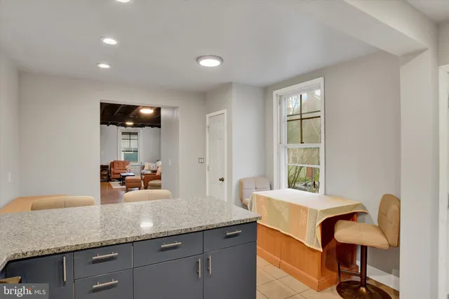 a kitchen with counter top space cabinets and a sink