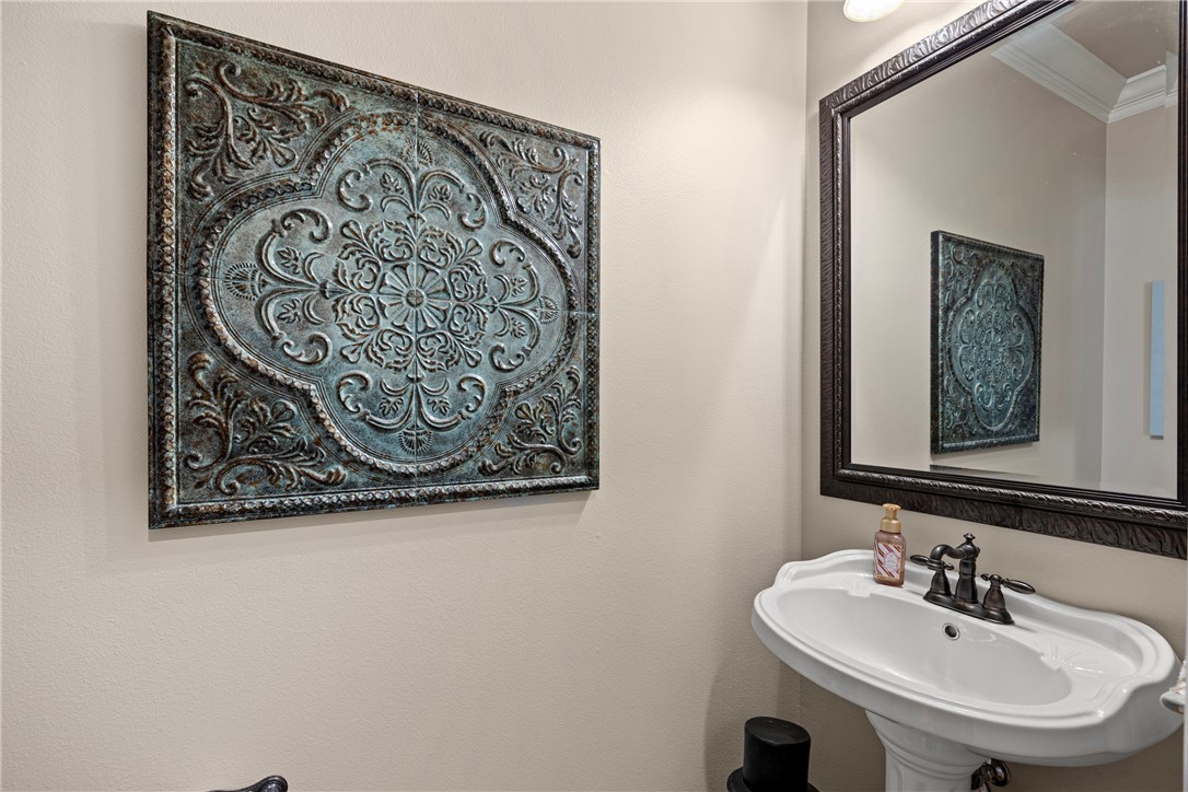 788 Cliff Road Russellville, AR 72802 - Photo 27 of 60 Bathroom featuring ornamental molding and a sink