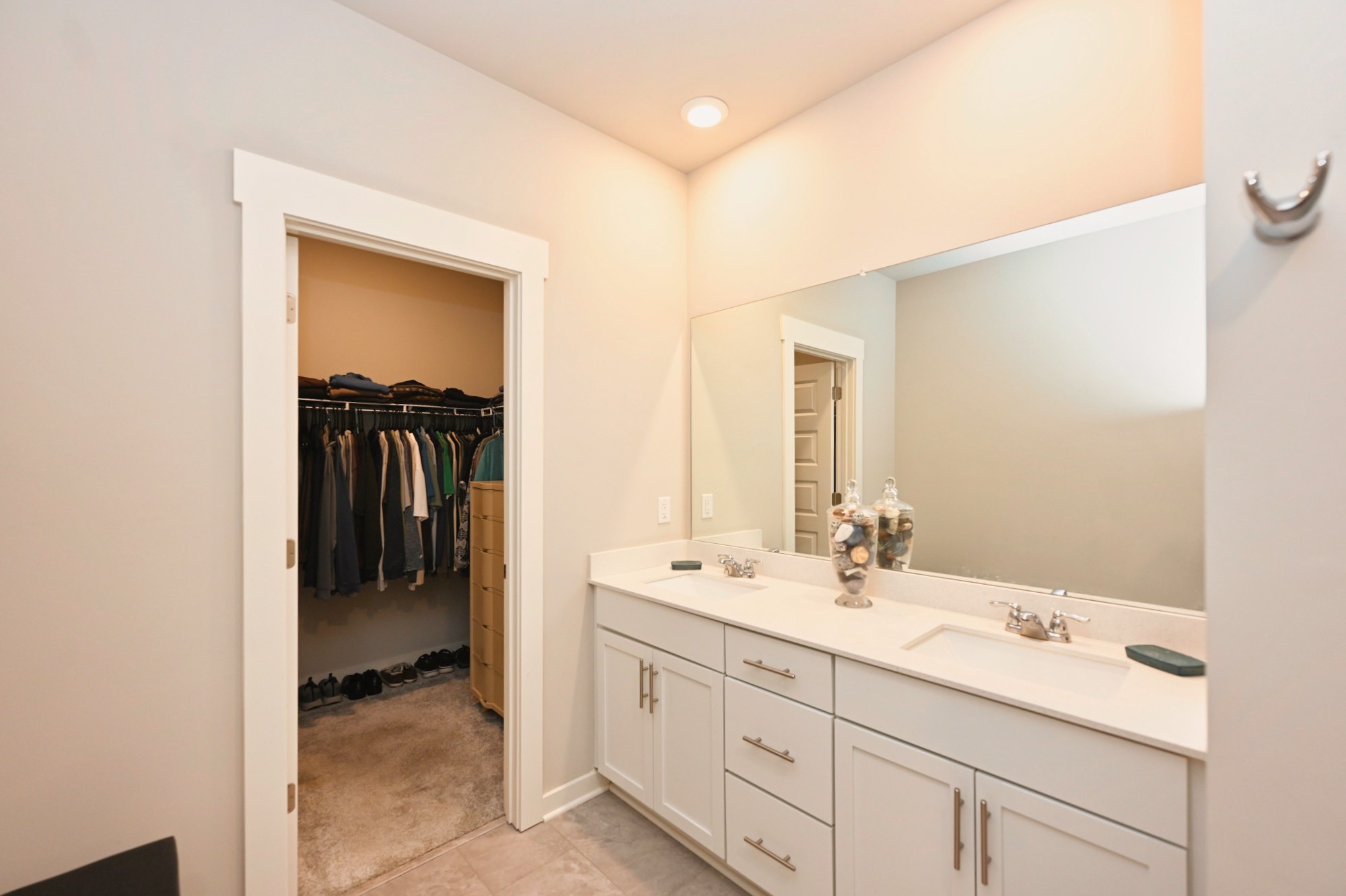 704 Mickelson Way Lebanon, TN 37087 - Photo 18 of 38 a bathroom with a sink double vanity and a mirror
