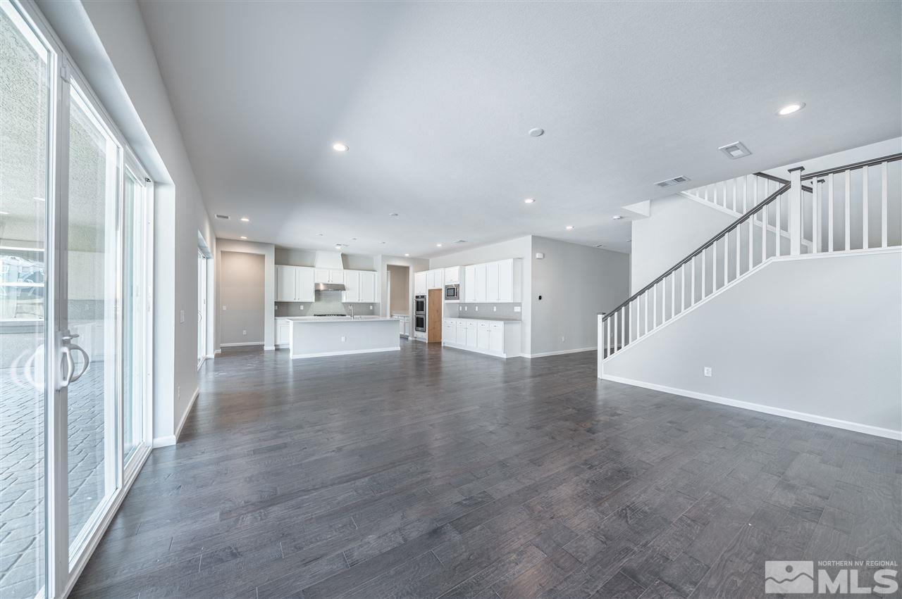 9276 Perceval Way, Unit HOMESITE 51 Reno, NV 89521 - Photo 4 of 21 a view of empty room with wooden floor
