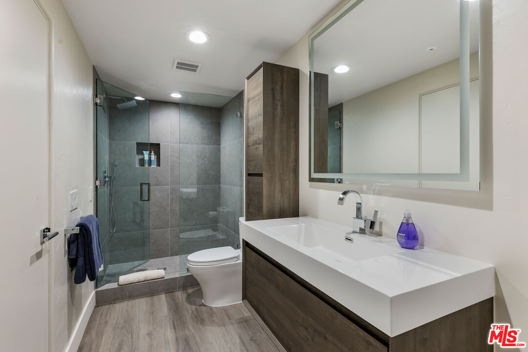 27336 Escondido Beach Road Malibu, CA 90265 - Photo 20 of 23 a bathroom with a sink a toilet and shower