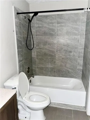 a bathroom with a sink and a toilet
