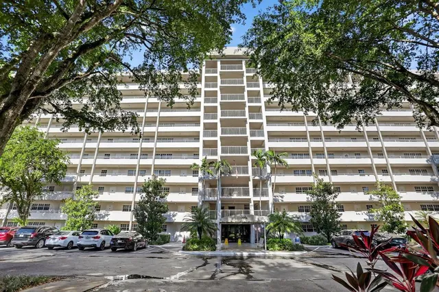 a front view of a building with a street