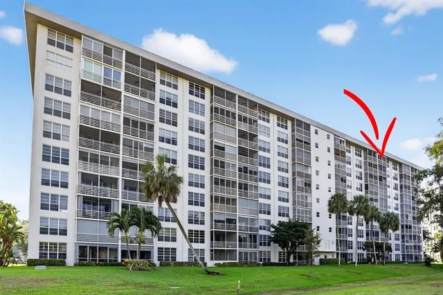 a view of building with yard