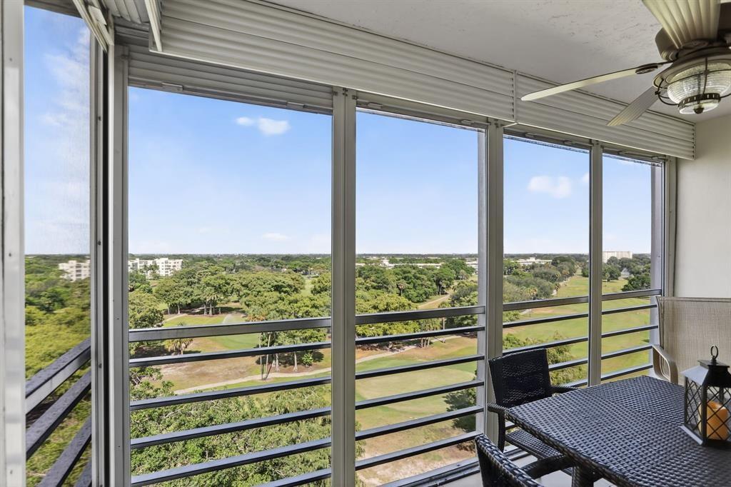 605 Oaks Drive, Unit 1008 Pompano Beach, FL 33069 - Photo 28 of 30 a view of a room with a large window