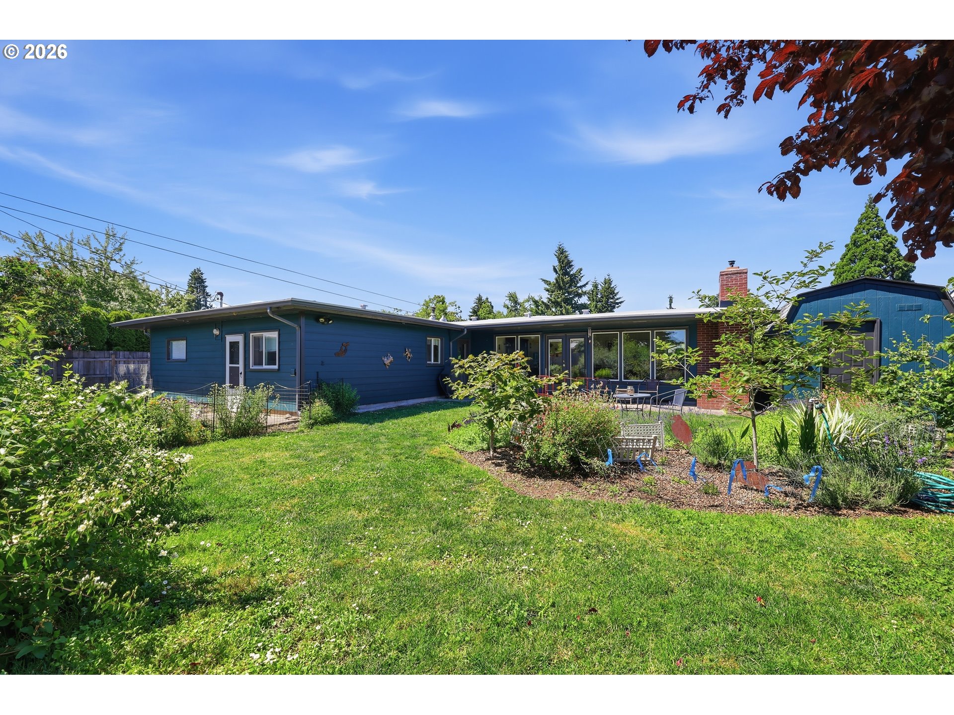 65 Greenvale Drive Springfield, OR 97477 - Photo 38 of 42 a view of a house with a big yard and potted plants