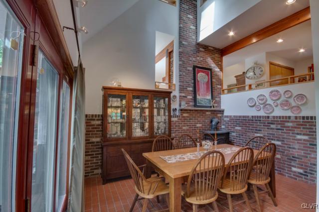 2005 Church Road Bethlehem, PA 18015 - Photo 9 of 26 Dining Room with Wood Burning Stove/Vaulted Ceilin