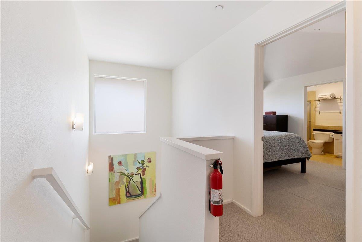 117 Gault Street, Unit B Santa Cruz, CA 95062 - Photo 22 of 42 a bedroom with a bed and a couch