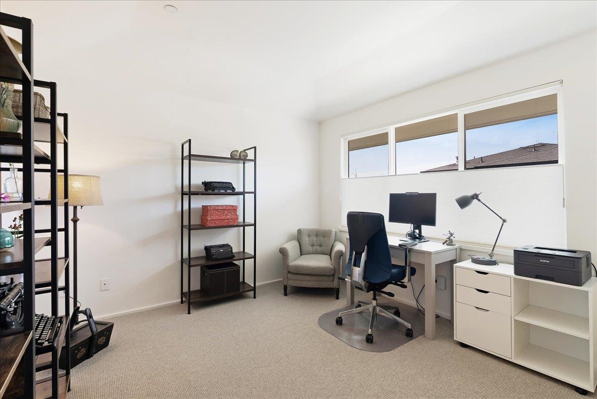 117 Gault Street, Unit B Santa Cruz, CA 95062 - Photo 25 of 42 a view of a workspace with furniture and a window