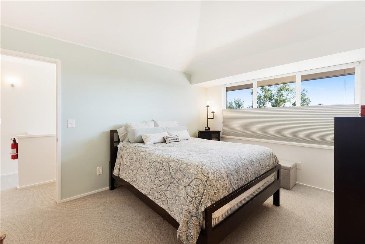 117 Gault Street, Unit B Santa Cruz, CA 95062 - Photo 28 of 42 a bedroom with a bed and window