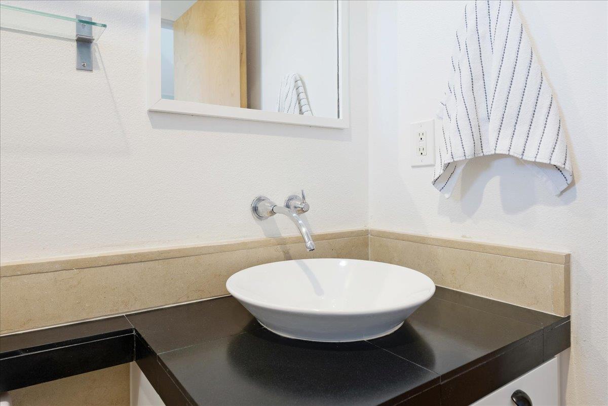 117 Gault Street, Unit B Santa Cruz, CA 95062 - Photo 30 of 42 a bathroom with a sink and a mirror